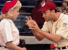 two baseball players are talking to each other