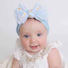 ⭐️Adorable hand tie embroidered tulle daisy bow on a soft and stretchy nylon headband. Our super soft and stylish nylon headbands are made to grow with your baby. No need to buy bows in different sizes. From tiny newborns to toddler years your baby will be able to wear this beauty for many years to come. Tested for babies' comfort, they won't slip off or leave compression marks on your baby's head. 6 beautiful colors to choose from.  ⭐️ BOW SIZE Bows measures 5x 3.5" Approx  ⭐️ HOW TO ORDER Plea Cute Blue Hair Accessories For Summer, Cute Blue Summer Hair Accessories, Cute Handmade Spring Headband, Handmade Cute Spring Headband, Whimsical Spring Hair Accessories With Matching Headband, Cute Adjustable Spring Headband, Cute Flower Shaped Headband For Spring, Cute Flower Headband For Spring, Whimsical Spring Headband For Gift