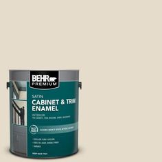 a yellow paint can with the words behr ultra stain - blocking paint and primer in