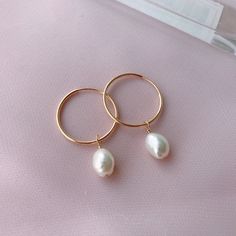 Gold Filled Pearl Hoop Earrings ❤️   These lovely two way wear baroque pearl earrings is definitely your every day wearing choice. Pearls can be removed from the hoop to make it more simple!  ♥ Material: Hoop- Made from high quality 14K gold filled which is tarnish-resistant, waterproof, safe for sensitive skin, and can guarantee long lasting wear. Pearl-Nature shiny freshwater pearls ♥ Size: Freshwater pearls are about 7mm-8mm               Hoops: 21mm ♥ Package: To avoid the over packaging and Handmade Minimalist Pearl Earrings For Everyday, Minimalist Handmade Pearl Earrings For Everyday, Small Hoop 14k Gold Filled Pearl Earrings, Handmade 14k Gold Filled Pearl Earrings For Everyday, Minimalist 14k Gold-filled Hoop Earrings With Pearl Charm, Minimalist 14k Gold Filled Small Hoop Pearl Earrings, Everyday 14k Gold Filled Earrings With Pearl Drop, Everyday 14k Gold Filled Pearl Drop Earrings, Dainty Gold Hoop Pearl Earrings