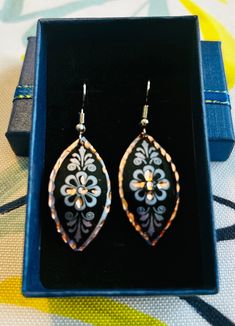 Elegant, handcrafted, cooper engraved Turkish earrings from Istanbul.  These Turkish handmade earrings are a perfect gift for someone special. Crafted from high-quality copper, they feature an intricate engraving that adds a touch of beauty to any outfit. The earrings are perfect for those who appreciate unique and exquisite jewelry pieces. The earrings are designed with a focus on beauty and elegance, making them a great addition to any jewelry collection. The engraved design adds a touch of so Engraved Metal Earrings As Gift, Engraved Metal Earrings For Gift, Engraved Teardrop Earrings For Gift, Artisan Black Earrings As Gift, Artisan Black Earrings For Gift, Artisan Black Earrings Gift, Unique Copper Earrings As Gift, Unique Copper Earrings For Gift, Traditional Rose Gold Jewelry For Gift