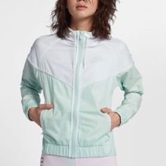 Size: Small White + Mint Windrunner Jacket. Woven Fabric Has A Smooth, Lightweight Feel. 100% Polyester. Nwot - Never Worn White Nylon Track Jacket For Winter, White Hooded Windbreaker In Athleisure Style, White Athleisure Track Jacket For Fall, White Nylon Athleisure Outerwear, White Sporty Outerwear For Spring, Sporty White Outerwear For Spring, White Spring Windbreaker For Sports, Nike Athleisure Outerwear For Spring, White Hooded Windbreaker Athleisure