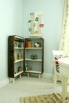 a room with a bookcase and table in it