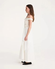 FINAL SALE The Folded Cotton Skirt in Optic White by Rohe is a full length, cotton poplin skirt featuring a font silt and folded front detail. 100% Cotton #412-32-044