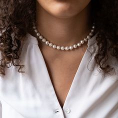 This pearl necklace is handknotted with a silk cord and finished off with a 12mm solid 14k gold sailors clasp. This necklace can easily be worn for special occasions or make it your everyday "me" necklace.The pearls are fresh water pearls with a beautiful high luster showing off the quality of the pearls and their near round shape gives them a unique characeter. The pearls measure approx 8mm which makes them your perfect statement necklace.Details:✦ Handknotted near round 8mm fresh water pearls✦ Classic Single Strand Pearl Beaded Necklace, Classic Single Strand Pearl Beaded Necklaces, Classic Akoya Pearl Beaded Necklaces, Classic Akoya Pearl Beaded Necklaces With Round Beads, Single Strand Akoya Pearl Necklace In Pearl White, Pearl White Single Strand Akoya Pearl Necklace, Classic Akoya Pearl Beaded Necklace With Pearl Chain, Classic Akoya Pearl Beaded Necklace With Pearl Charm, Gold Pearl Necklace