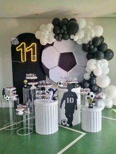 a soccer themed birthday party with balloons and decorations