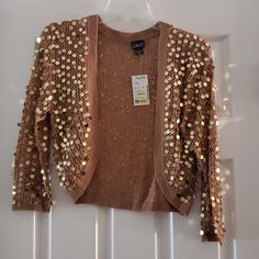 Gold Bedazzled Sweater. Size Large Embellished Gold Outerwear For Spring, Spring Embellished Gold Outerwear, Gold Embellished Outerwear For Spring, Gold Cardigan For Fall Party, Gold Cardigan For Spring Party, Gold Cardigan For Party In Spring, Spring Fitted Embellished Cardigan, Fitted Embellished Spring Cardigan, Bedazzled Sweater