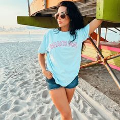 Beach Bum Tee | Shop Mountain Moverz T-Shirts Casual Relaxed Fit T-shirt For Poolside, Summer Crew Neck T-shirt For Poolside, Beachy Cotton Tops For Poolside, Cotton Beachy Tops For Poolside, Beachy Cotton T-shirt With Short Sleeves, Summer Cotton T-shirt For Poolside, Blue Cotton T-shirt For Beach Season, Poolside Crew Neck T-shirt For Beach Season, Crew Neck T-shirt For Poolside And Beach Season