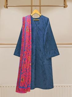 vibrant and fashionable embroidered lawn shirt with pant and dupatta perfect for adding a touch of elegance and style to your wardrobe. Made from high-quality lawn fabric, this shirt offers comfort and breathability, making it an ideal choice. Length : 45" Pants Fabric : Lawn Dupatta Fabric : Lawn Suit Navy Blue, Lawn Suit, Lawn Fabric, Lawn Shirts, India And Pakistan, Lawn Suits, Shalwar Kameez, Stylish Dress Designs