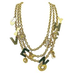 A standout Vintage Givenchy Logo Charm Collar. Crafted in gold plated metal, crystals and faux pearls. Featuring three lavish chunky chains embellished with an array of logo centric charms including ultra large GIVENCHY spell out letter charms. In very good vintage condition, signed and approx. 54cm length for the shortest chain and approx. 11cm drop. An absolutely fantastic runway piece from the House of Givenchy that will be sure to make the perfect couture statement. Dress it up or down. The Jennifer Gibson, Givenchy Jewelry, Givenchy Logo, Chain Collar, Chanel Chain, Vintage Givenchy, Charm Chain, Vintage Jewels, Letter Charms