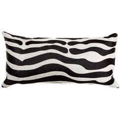 a black and white zebra print pillow on a white background