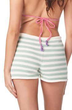 An easy drawstring tops these boldly striped cover-up shorts. Drawstring waist 100% acrylic Hand wash, dry flat Made in Peru Hispanic & Latinx Owned/Founded Spring Beachwear Pajama Shorts With Drawstring, Striped Cotton Beach Shorts, Beachy Cotton Shorts With Drawstring, Beachy Cotton Drawstring Shorts, Striped Summer Bottoms For Vacation, Summer Vacation Striped Bottoms, Spring Striped Cotton Swimwear, Striped Beachwear Bottoms For Beach Season, Striped Tie-side Bottoms For Vacation