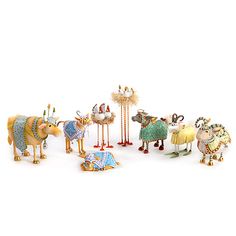 an assortment of figurines in the form of animals