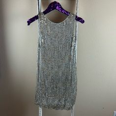 Preowned Alice + Olivia Women's Silk Sleeveless Silver And Gold Sequin Dress Size 2. Armpit To Armpit 14.5in And From Shoulder To Bottom Hem 32.5in. Zipper Is In Excellent Working Condition, No Missing Beads. Shell 100% Silk Lining 95% Polyester 5% Spandex. Smoke/Pet/Stain/Hole Free. Made In India. I Wore This Dress For My Courthouse Wedding. Save $10 Off Your First Purchase When You Sign Up For Poshmark Using My Code Fromtxswithlove Metallic Embellished Sleeveless Mini Dress, Sleeveless Embellished Metallic Mini Dress, Embellished Sleeveless Metallic Mini Dress, Metallic Sleeveless Mini Dress With Sequins, Metallic Sleeveless Sequin Dress For Party Season, Metallic Embellished Sleeveless Dress, Silver Sleeveless Sequin Evening Dress, Metallic Sleeveless Mini Dress For Cocktail, Silver Sleeveless Sequin Dress For Evening