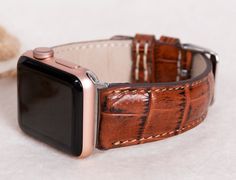 Croco pattern brown Apple watch strap for series 1-10 & SE & Ultra 1-2.  Material: full grain leather (leather is not croco). Our leathers are premium quality full-grain leather tested by international firms. This band is M/L size and fits 160-200mm (6.4"-8") wrists. The color of the buckle will be the same of the adapter color. Customization: We can write names, dates, texts on straps.  CUSTOMER SATISFACTION GUARANTEE: If you are not satisfied with our items within 30 days after you receive the Modern Brown Rectangular Apple Watch Band, Brown Leather Strap Apple Watch Band, Modern Brown Rectangular Watch Accessories, Modern Brown Apple Watch Band As Gift, Brown Rectangular Watch Accessories With Bracelet Strap, Brown Rectangular Bracelet Strap Watch Accessories, Brown Adjustable Rectangular Watch Bands, Brown Bracelet Strap Apple Watch Band For Gift, Brown Bracelet Strap Apple Watch Band As Gift