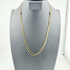 Add a touch of quiet luxury to your summer wardrobe with this enchanting vintage necklace. This minimalist piece features a delicate gold chain, perfect for adding a touch of sophisticated elegance to any outfit. The necklace lays beautifully on the collarbone, making it a versatile piece that can be dressed up or down. Whether you're a fan of vintage style or simply love minimalist jewelry, this necklace is a must-have. Size: 8.75 inch drop, Adjustable Slide *Condition: Some minor finish wear as shown in photos. Previously owned and in great condition, making it a valuable find for any collector. ~ Thank you for supporting my Latina | Female | Air Force Veteran owned small business. Please check out the other vintage jewelry items in my shop to fill your soul. Offers Always Welcome #layer Minimalist Snake Chain Layered Necklace, Gold-tone Long Minimalist Chain Necklace, Chic Gold Double Strand Chain Necklace, Elegant Everyday Gold Long Necklace, Minimalist Gold Plated Double Chain Charm Necklace, Elegant Formal Snake Chain Necklace With Adjustable Chain, Classic Gold Snake Chain Necklace For Everyday, Chic Gold Layered Necklace With Clavicle Chain, Elegant Everyday Gold Layered Necklace