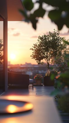 the sun is setting over an outdoor patio with furniture and potted plants on it