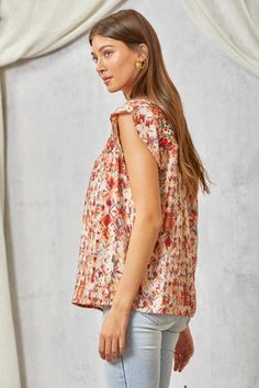 Savanna Jane Artistic print blouse, featuring embellished floral embroidery at neckline front and back and flowers on front. Non sheer. Round neckline. Ruffle flutter cap sleeves. Super pretty! Color: Multi Sizes: S-M-L-XL Bust 36-38-40-42, Length 26-2783% Rayon, 17% Nylon, hand wash cold, imported C4/16369-14 Spring Printed Blouse With Butterfly Sleeves, Spring Blouse With Printed Butterfly Sleeves, Bohemian Blouse With Printed Ruffle Sleeves, Bohemian Floral Print Tops With Butterfly Sleeves, Bohemian Tops With Floral Print And Butterfly Sleeves, Summer Butterfly Sleeve Printed Blouse, Summer Printed Blouse With Butterfly Sleeves, Summer Floral Print Blouse With Butterfly Sleeves, Summer Butterfly Sleeve Blouse With Floral Print