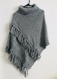 Steve Madden Women's Cable Knit Poncho Heather Grey One Size NWT You wear over a sweater Winter Knitted Acrylic Poncho, Casual Knitted Shawl Poncho, Gray Poncho For Cold Weather In Fall, Casual Knitted Poncho Shawl, One Size Acrylic Yarn Poncho For Fall, Casual One Size Knit Poncho, Gray Winter Shawl Poncho, Gray Shawl Poncho For Winter, Gray Knitted Sweater One Size