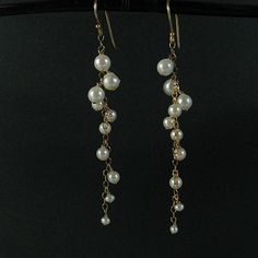 "Pretty white akoya and freshwater pearls dangle from gold filled sterling chain. Perfect earrings for a bride wearing a strapless gown. The earrings hang 3 and 3/4 \" with gold plate sterling ear wires." Yellow Gold Pearl Drop Dangle Chandelier Earrings, Dangle Pearl Chain Earrings For Anniversary, Gold Sterling Silver Pearl Chain Earrings, Gold Briolette Pearl Earrings For Wedding, Anniversary Long Drop Pearl Earrings, Gold Akoya Pearl Dangle Earrings, Pearl Dangle Earrings, Strapless Gown, White Freshwater Pearl