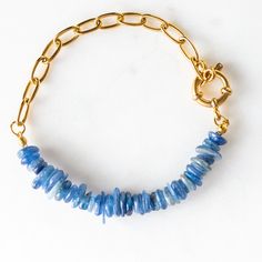 This Unique Handcrafted Statement Piece Features Beautiful Blue Genuine Kyanite Chips With Half Gold Pvd On Stainless Steel (Water-Friendly & Hypoallergenic) Chunky Paperclip Chain. Meaning & Energy: Kyanite Is A Powerful Crystal With Incredible Energetic Properties. Known To Enhance Communication, Mental Clarity, And Decision-Making. It Also Has A Calming And Grounding Energy, Aligns Chakras, And Connects Us To Our Intuitive Abilities. Kyanite Is The Alternative Birthstone For February And Marc Everyday Blue Bracelet With Adjustable Chain, Blue Adjustable Chain Bracelet For Everyday, Elegant Blue Chain Bracelet For Everyday, Blue Gemstone Bracelets For Everyday Wear, Everyday Blue Gemstone Beads Jewelry, Adjustable Blue Chain Bracelet, Everyday Blue Bracelet Jewelry, Blue Everyday Bracelet Jewelry, Classic Athleisure