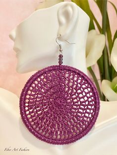 Lightweight Earring is 2.75" in diameter Earring drop is 3.75" 🌐Follow on social media:  Instagram: @fiberartfashion  Facebook: @fiberartfashion TikTok: @fiberartfashion Luxury Handmade Purple Earrings, Purple Bohemian Round Hoop Earrings, Bohemian Purple Round Hoop Earrings, Handmade Purple Dangle Hoop Earrings, Nickel-free Purple Earrings For Party, Purple Clip-on Earrings For Party, Purple Bohemian Crochet Jewelry, Adjustable Pink Crochet Jewelry, Light Weight Earrings