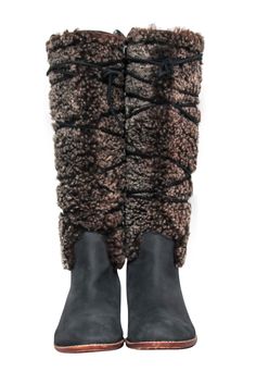 Don't brave the winter cold alone- take these cozy-chic Matt Bernson boots with you! Perfect for adding a bit of height to to your cold-weather gear, these gorgeous leather boots feature playful crisscross laces over the soft salt and pepper shearling exterior. Pair with jeans and a cropped puffer jacket to stay cute in the cold. Size 6.5 Shearling exterior Leather sole Stacked heel Crisscross lace details Round toe Shaft14.75" Circumference 16" Heel 1.2" Brown Knee-high Boots For Winter, Lace-up Winter Boots With Suede Lining, Leather Boots With Faux Fur Lining For Cold Weather, Cozy Winter Boots For Cold Weather, Leather Boots For Cold Weather And Winter, Fall Boots With Faux Fur Lining, Cozy Winter Boots With Plush Lining, Leather Boots For Cold Weather, Cozy Leather Boots For Fall