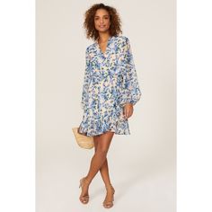 Blue floral chiffon (100% Polyester). Wrap. V-neck. Long sleeves. Tie closure. 37" from shoulder to hemline. Imported. Blue Floral Mini Dress, Rent The Runway, Closet Designs, Floral Chiffon, Floral Mini Dress, Dress First, Blue Floral, Blue Dresses, Puff Sleeve