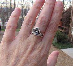 R1296- Sterling Silver Swirl/ Scroll Ring , Size 8. I can size it to fit, just contact me. No charge to size down, and no charge for one size up. Sturdy Casual Everyday ring. The swirl or scroll give it a Victorian or Egyptian feel. Would be a great gift for Her or for Teenage Girls. It is a One of a Kind Ring made by me from Start to finish. Would make a Great Thumb Ring. Swirl reminds me of a Ocean wave. The top of the ring measures 12.5 mm and the band is 2 mm. This ring is made by the Lost w Unique Swirl Rings For Anniversary, Artisan Rings, Everyday Ring, Thumb Ring, Casting Jewelry, Cabochon Ring, Everyday Rings, Ocean Wave, Original Jewelry