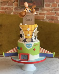 a toy story themed cake on a table