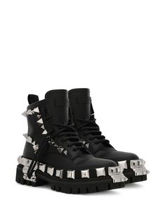 Find DOLCE & GABBANA Studded Leather Combat Boots on Editorialist. black leather grained texture silver-tone stud detailing round toe front lace-up fastening side zip fastening ridged rubber sole pull-tab at the heel Leather Boots With Spikes For Streetwear, Spiked Leather Boots For Streetwear, Punk Leather Moto Boots With Silver Studs, Punk Leather Boots With Silver Studs, Black Leather Lace-up Boots With Studded Outsoles, Designer Leather Boots With Spikes, Black Calf Leather Boots With Rivets, Edgy Leather Moto Boots With Spikes, Leather High-top Moto Boots With Studs