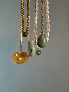 This dainty gemstone necklace with a pop of light green color features a skinny adjustable chain plated with gold and an aventurine pendant. It will be your new everyday necklace no matter the outfit.

Natural aventurine. Made by handwork of carving and polishing. Because of the gemstone’s natural characteristics, each piece may vary slightly in colors and textures. Gold Jade Necklace With Gemstone Beads, Minimalist Jade Round Pendant Necklace, Gold Minimalist Charm Necklaces With Natural Stones, Minimalist Gold Charm Necklaces With Natural Stones, Minimalist Gold Charm Necklace With Natural Stones, Dainty Gold Jade Necklace, Nature-inspired Jade Pendant Necklace, Green Adjustable Chain Charm Necklace For Everyday, Delicate Green Necklace For Everyday Wear