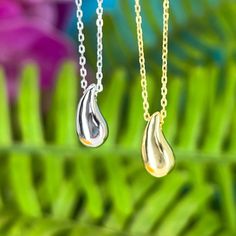 Showcase you love of water with our stunning and modern Wai Raindrop pendant. Water is life in Hawaii and this beautifully designed pendant is sure to add elegance and sophistication to any outfit. .925 Sterling Silver Approx. 1/2" Tall Available in 14K Gold Plated or Silver Includes 18" Adjustable chain w/1" extension Anniversary Drop Jewelry With Polished Finish, Teardrop Shaped Jewelry With Shiny Finish For Anniversary, Silver Water Drop Earrings As Gift, Sterling Silver Teardrop Jewelry With Shiny Finish, Drop Shaped Jewelry With Shiny Finish For Gifts, Modern Teardrop Necklace For Anniversary, Sterling Silver Drop Necklace With Polished Finish For Gift, Sterling Silver Polished Drop Necklace Gift, Sterling Silver Drop Necklace As Gift