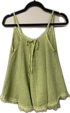 Chic Tie-back Tank Top For Vacation, Chic Summer Tops With Tie Straps, Summer Tops With Tie Straps For Day Out, Sleeveless Tie Back Blouse For Summer, Summer Sleeveless Blouse With Tie Back, Tie Back Sleeveless Blouse For Summer, Spring Tank Top With Tie Straps, Spring Vacation Tops With Tie Straps, Summer Tank Top With Tie Straps For Spring