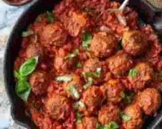 meatballs with tomato sauce in a skillet