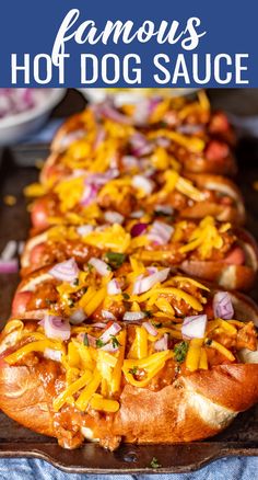 hot dogs covered in cheese and onions are lined up on a baking sheet with text overlay