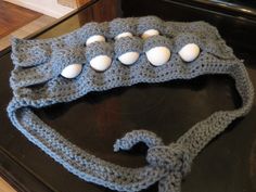 a crocheted bag with eggs on it