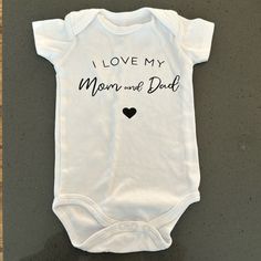 I Love My Mom And Dad Infant Onesie. Free With Purchase. Mustard Yellow Pants, Minnie Outfit, I Love My Mom, Love My Mom, Pink Onesie, Yellow Pants, Patriotic Outfit, Dad Baby