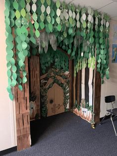 a room decorated in green and white paper