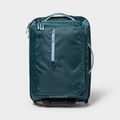 You'll never feel disorganized on vacation again when you pack your items into this 22.5" Softside Carry-On Suitcase from Embark™. The main compartment of this teal softside suitcase features both cross straps and a large zip pocket to help keep your things organized, and there's also an exterior zip pocket to give you extra space for storing small essentials. The interior is lined to help protect your items, while the main zipper closure keeps everything securely inside the suitcase. With a whe Best Carry On Bag For Women, Lightweight Carry On Luggage, Underseat Carry On, Best Carry On Bag, Thailand Honeymoon, Best Travel Accessories, Lightweight Luggage, T Strap Flats, Travel Necessities