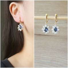 Dark Navy crystal hoop clip on earrings, metal is gold plated over brass. Details :- **Dark Blue oval shape crystal size is 8mm x 6mm. **Hoop clip on size is 11mm(inner diameter) and 13mm(outer diameter). **Earrings length is 35mm, width is 16mm. **Approx weight is 2.4g (4.8g per pair) ♥ ♥ Hoop clip on - are comfortable to wear and will not drop off easily, and they look like pierced ear earrings. ♥ ♥ These earrings come in a beautiful gift box. ♥ ♥ Pls convo us if you have any queries. ♥ ♥Thank Non Pierced Earrings, Pierced Ear, Ear Earrings, Earrings Metal, Earrings Blue, Pierced Earrings, Blue Earrings, Earrings Dangle, Beautiful Gift Boxes