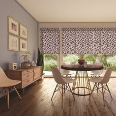 a dining room with wooden floors and purple walls