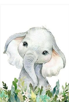 an elephant with flowers and leaves on it's head is standing in the grass