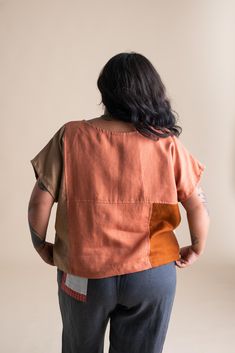 Add some fun to your wardrobe with the Patchwork Painter Top, a best-seller designed for both style and comfort. Featuring a relaxed, boxy fit, this top drapes beautifully, offering a flattering silhouette that complements any body type. Its versatile design makes it a seasonal staple, perfect for layering through fall and beyond. Crafted with love by Olivia + Esme, each top is made from carefully curated fabric scraps collected throughout the year, making every piece unique. Spring Boxy Workwear Tops, Spring Boxy Tops For Workwear, Patchwork Short Sleeve Blouse For Layering, Relaxed Fit Patchwork Top With Crew Neck, Effortless Short Sleeve Tops For Fall, Summer Linen Patchwork Tops, Oversized Patchwork Tops For Layering, Boxy Fit Short Sleeve Top For Layering, Patchwork Crew Neck Top For Office