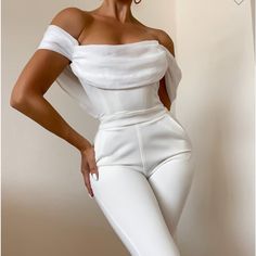 White Off Shoulder Flared Crepe Jumpsuit Size M Materials: Woven Stretch Crepe / Pleated Silk / Boned Corset Size M Sleek Jumpsuit, Miss Circle, Crepe Jumpsuit, Olive Green Pants, Belted Romper, Boned Corsets, Ruffle Jumpsuit, White Off Shoulder, White Jumpsuit