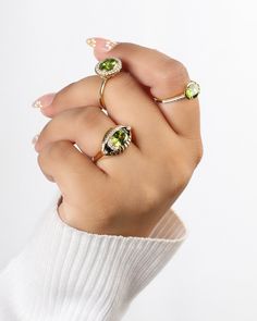 Bold, beautiful, and undeniably boss - packed with a punch of peridot that's as sunny as your disposition, the Dayglow Ring is ready to add a dash of glow to your everyday ensemble. Whether you're conquering the world or simply conquering your coffee, this ring is your go-to glow-up. Slip it on and let the compliments roll in. Your jewelry is designed to last a lifetime, but keep in mind that they are still made from precious metals and delicate stones. While our jewelry pieces can be worn every Fine Jewelry Lime Green Diamond, Fine Jewelry With Lime Green Diamond, Fine Jewelry In Green Peridot, Green Peridot Fine Jewelry, Fine Green Peridot Jewelry, Lime Green Gemstone Ring Jewelry, Lime Green Gemstone Ring, Lime Green Diamond Gemstone Rings, Lime Green Diamond Ring With Gemstone