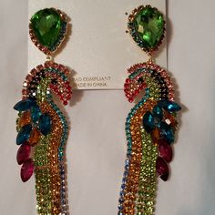 Natasha Tucan Post Earrings. Multi Color. Eye-catching Multicolor Jewelry For Party, Elegant Multicolor Peacock Design Jewelry, Green Peacock Design Jewelry For Party, Eye-catching Dangle Earrings For Party, Eye-catching Multicolor Party Jewelry, Elegant Blue Peacock Design Earrings, Multicolor Jeweled Costume Jewelry Earrings, Multicolor Peacock Design Earrings For Party, Peacock Design Dangle Earrings For Party