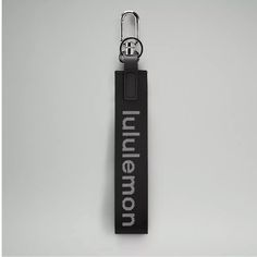 Lululemon Never Lost Keychain Black / Gray Brand New! New With Tag (Nwt)! Never Worn. Keep You Keys Close At Hand By Clipping Them To Your Bag. Designed For On The Move! About 1.7” X 12” 88% Recycled Nylon, 12% Recycled Polyester Lululemon Wordmark On The Wrist Strap Care: Spot Clean Only Any Questions? Please Ask. Lululemon Never Lost Keychain, Never Lost Keychain, Keychain Black, Wrist Lanyard, Card Pouch, Keychain Wallet, Pink Sparkle, Key Card Holder, White Opal