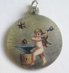 ANTIQUE ART NOUVEAU SILVER ENAMEL BLACKSMITH CUPID CHERUB w RUBY SPARKS CHARM #CUPIDHAMMERINGOUTLOVEHEARTSCHARM #ADORABLECUPIDCHERUBBLACKSMITHCHARM Ruby Sparks, Cupid Cherub, Plain Jewelry, Art Nouveau Silver, Vintage Charm Bracelet, Antique Bracelets, Vintage Lockets, Heirlooms Jewelry, Gold Charms