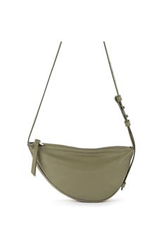 The Tess Sling combines the accessibility of a belt bag with the body-skimming comfort of a crossbody. Kitted with interior pockets and a long adjustable strap, this must-have bag is perfect for anyone who prioritizes straightforward, functional design. 6in L x 2.625in W x 11.5in H; Drop: 20 inches; Weight: 0.62 lb Interior: Repreve Lining Main zipper closure Adjustable Strap Interior contains a back zipper pocket and a slip pocket Adjustable leather sling strap Premium leather from a Leather Wo Modern Crossbody Belt Bag With Zipper Closure, Versatile Shoulder Belt Bag With Adjustable Strap, Versatile Belt Bag With Adjustable Strap, Modern Crossbody Belt Bag With Zipper Pocket, Versatile Crossbody Belt Bag With Zipper Pocket, Functional Crossbody Hobo Bag With Adjustable Strap, Versatile Green Chest Bag With Adjustable Strap, Crossbody Belt Bag With Adjustable Strap For On-the-go, Modern Crossbody Saddle Bag With Adjustable Strap